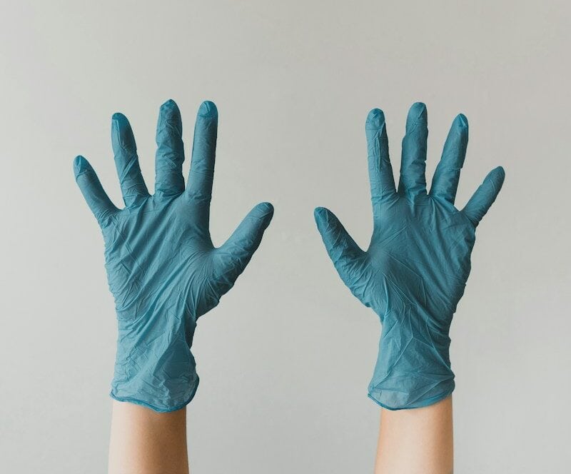 persons left hand with white background